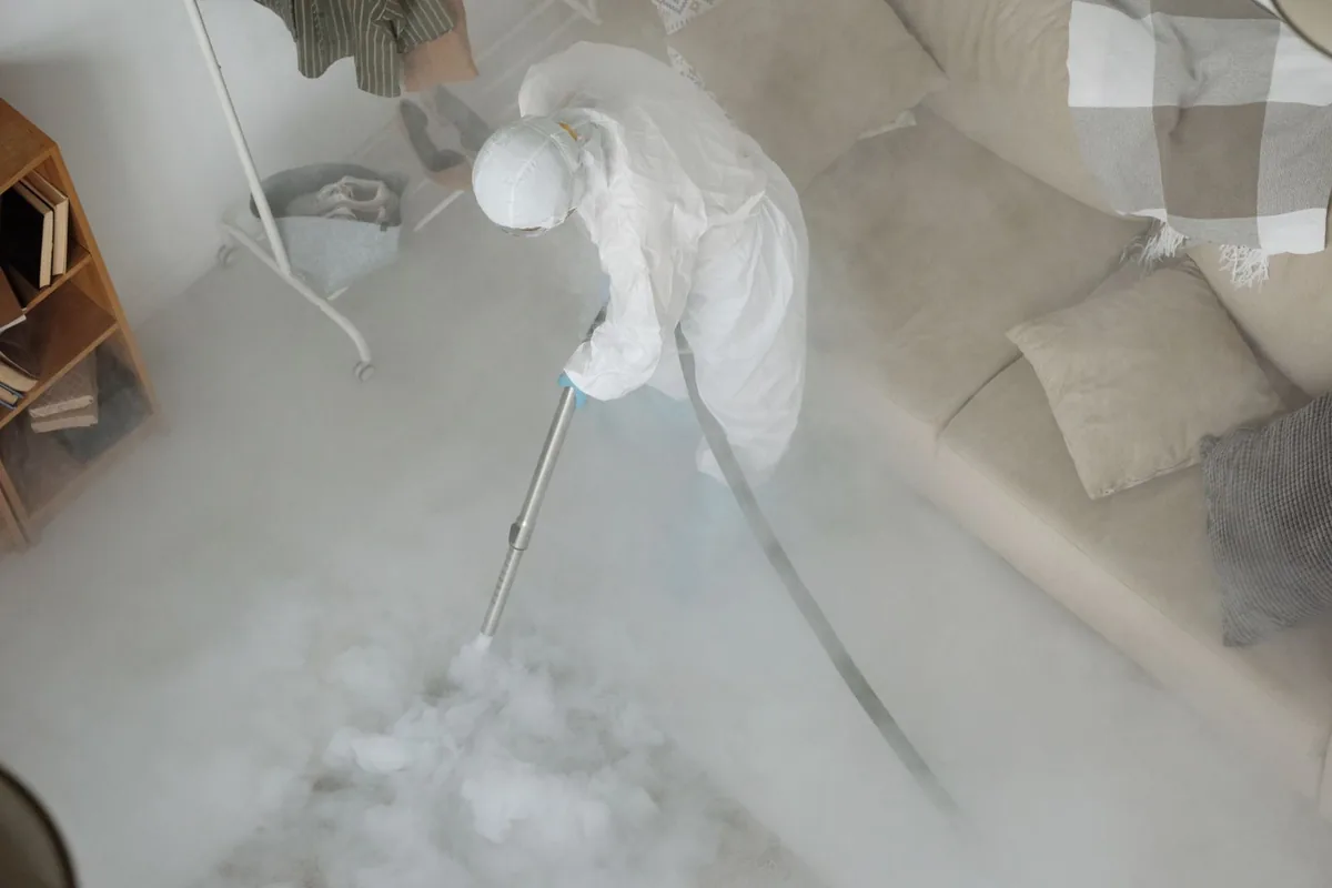 Biohazard cleanup technician in protective equipment, Lawrence Park, Sacramento, CA
